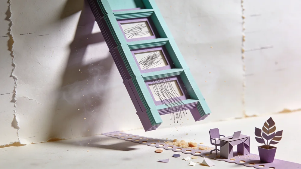 A clean paper-craft style diagram of a “keyword ladder” with 5 rungs (broad to specific) plus a small example (e.g. Home Offi